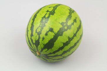 Watermelon on gray background close up