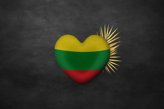 Textile heart in colors of national flag. Photography and marketing digital backdrop. Lithuania