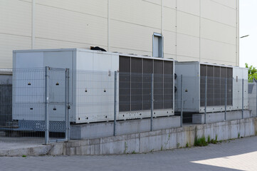 Large industrial air conditioner on the side of the mall.