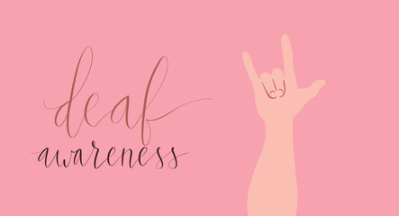 Deaf awareness month september handwritten calligraphy. Human hand showing I love you in sign language © stournsaeh