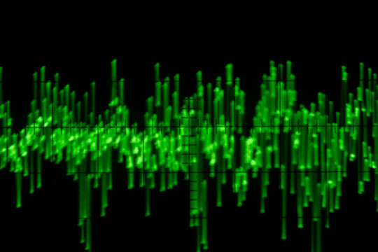 Audio signal on oscilloscope screen. Communication and electronics. Close up