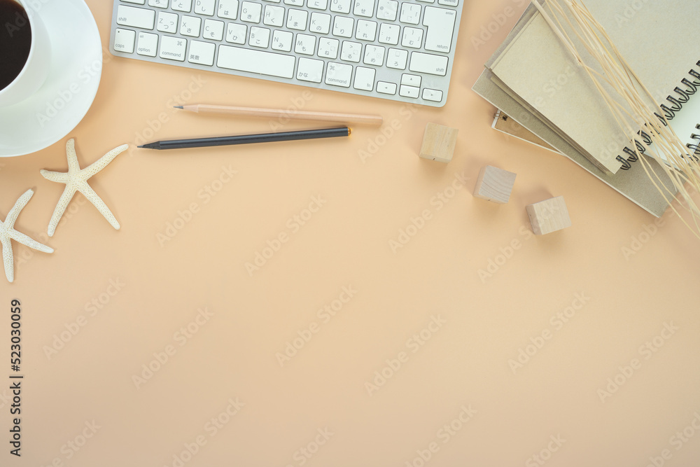 Poster Flat lay of top view desk work table with Coffee computer notebook and pencil work space in minimal orange color autumn tone concept includes copyspace for add text or graphic