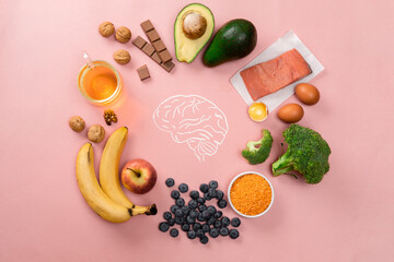 Best foods for brain and memory on pink background. Food for mind and charge of energy. Healthy lifestyle. Copy space. Top view