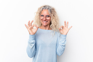 Middle age caucasian woman isolated on white background cheerful and confident showing ok gesture.