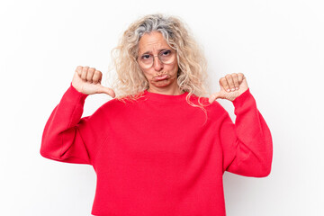 Middle age caucasian woman isolated on white background showing a dislike gesture, thumbs down. Disagreement concept.