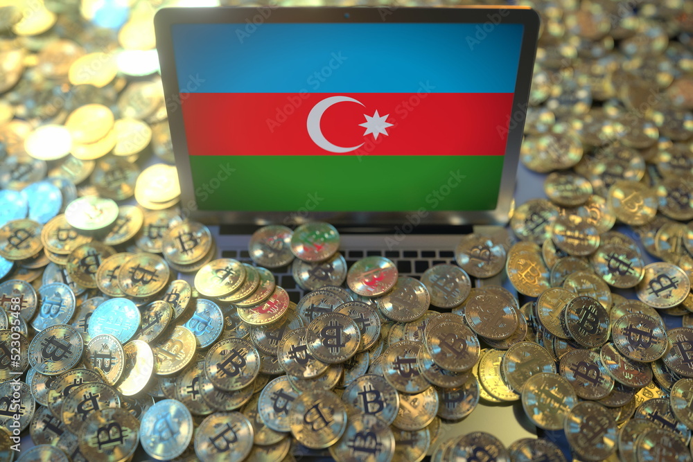 Aufkleber computer with flag of azerbaijan and pile of bitcoins. national regulations and cryptocurrency minin