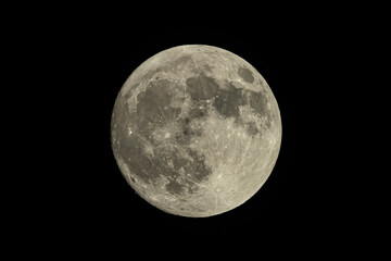 Full moon with black background, shot with telephoto lens