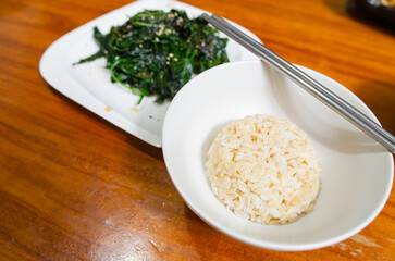 Simple vegetarian dish with eggs, tofu and sauteed vegetables.