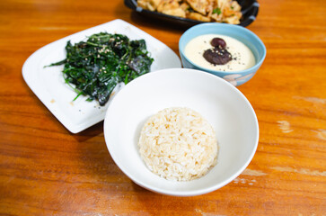 Simple vegetarian dish with eggs, tofu and sauteed vegetables.