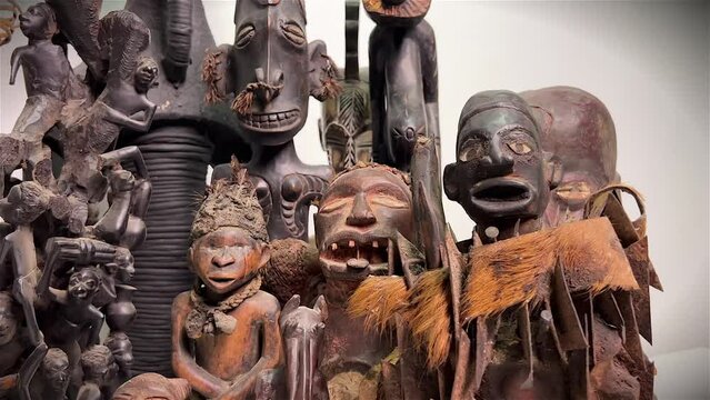 African statue filmed with dolly camera