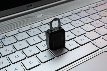 IT security concept with lock on keyboard
