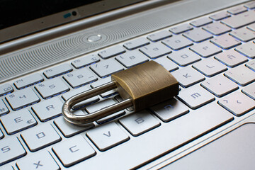 Internet security concept with padlock protecting computer
