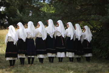 People in traditional folk costume of The National Folklore Fair in Koprivshtica. The National...