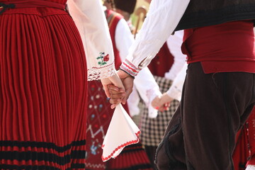 People in traditional folk costume of The National Folklore Fair in Koprivshtica. The National...