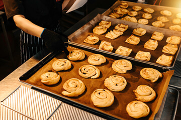 hand holding a tray of cookies, Bakery in tray in bakery shop, Homemade bakery business