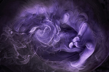 Purple lilac multicolored smoke abstract background, acrylic paint underwater explosion