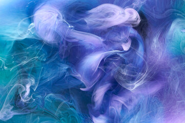 Blue multicolored smoke abstract background, acrylic paint underwater explosion