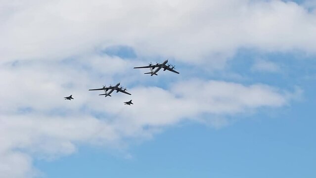 Saint-Petersburg, Russia. Flying display and aerobatic show of the Russian Military Air Force. Jet planes flying in the bright blue sky.