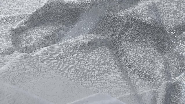 Small white particles pulsate and flow, creating abstract shapes. Futuristic animation background, 3D rendering, circles, 4K balls movement graphics.