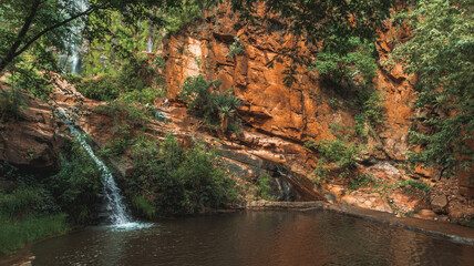 Fototapeta na wymiar Beautiful waterfall into rainforest. Scenic landscape. Landscape photography.