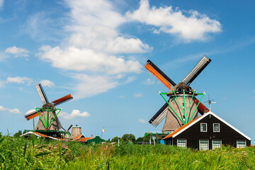 Fototapeta na wymiar Windmills in Zaanse Schans, traditional village in Holland.