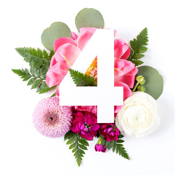 Creative layout with colorful flowers, leaves and number four isolated on white background. Anniversary concept. Flat lay.