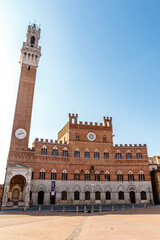 Fototapeta na wymiar Exterior of the city hall (in italian: Palazzo Comunale or Palazzo Pubblico) in Siena, Tuscany, Italy, Europe