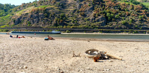 Cargo ship on the Rhine at low water near the Loreley