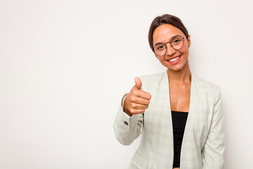 Young hispanic woman isolated on white background smiling and raising thumb up