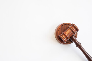Judge's gavel on light background, top view. Law concept.
