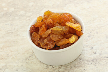 Sweet yellow raisin in the bowl