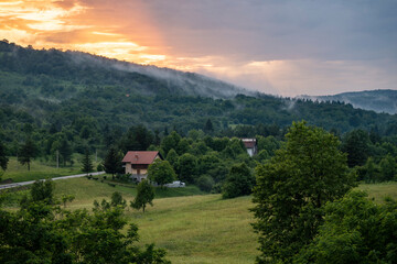 Fototapeta na wymiar Magnificent landscape of Rakovica woods and meadows, after the strong, summer rain at sunset, Croatia