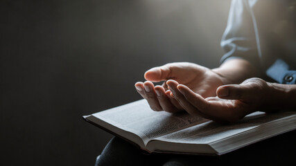 Put your hands together and open the bible. Concept of Hope, Faith, Christianity, Religion, Church, Belief, Forgiveness