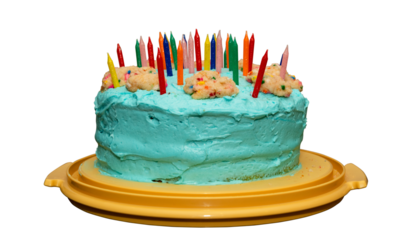 Blue frosted colorful birthday cake with a transparent background