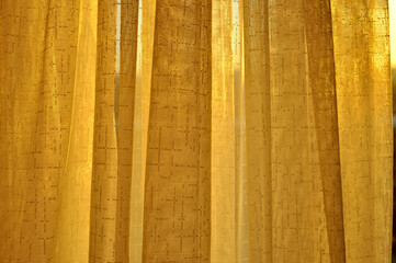 curtains with a golden sunset lights