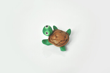 Turtle made of plasticine. Top view