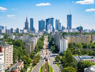 Skyscrapers in city center, Warsaw aerial landscape under blue sky © lukszczepanski
