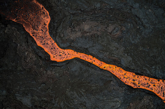 A week old Volcano in Meradalir,  Fagradalsfjall volcano in Iceland 2022. August 9th. Fissure in Geldingadalir. Amazing volcanic eruption on reykjaness. Top down lava river aerial drone shot