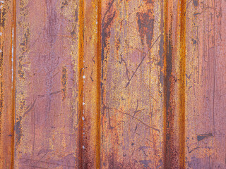 Texture of rusty metal. Rough surface of metal with rust. Corroded and oxidized old iron. Rusted metal wall of the container. Perfect for a Grunge background and design.