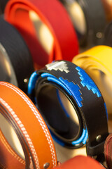 Coiled colorful leather belts