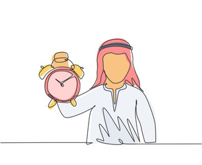 Single continuous line drawing young Arab business man holding analog alarm clock with his hand. Time management business minimalist concept. Dynamic one line draw graphic design vector illustration.