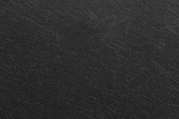 Dark grey black slate background or texture.