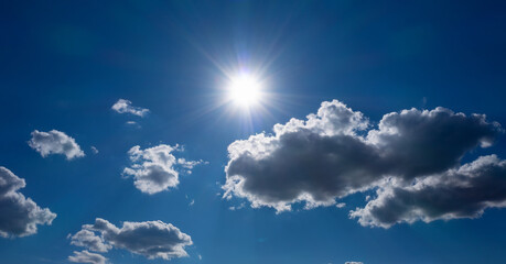 Bright sun in the blue sky. natural background.