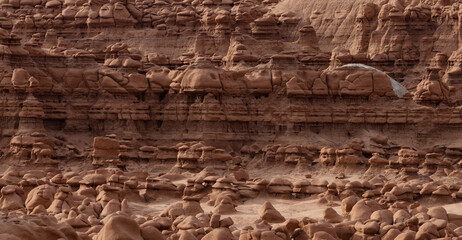 Red Rock Formations and Hoodoos in the Desert at Sunrise. Spring Season. Goblin Valley State Park. Utah, United States. Nature Background.