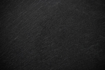 Dark grey black slate background or texture.
