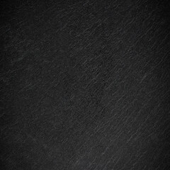 Dark grey black slate background or texture.
