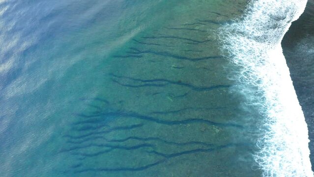 Aerial Panning Shot Of Pattern In Wavy Sea - Suva, Fiji