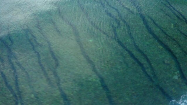 Aerial Panning Beautiful Shot Of Patterned Sea With Waves - Suva, Fiji