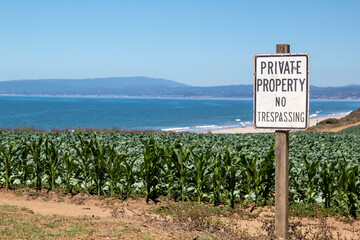 Private Property no trespassing sign on farm land - obrazy, fototapety, plakaty