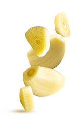 Peeled and Sliced garlic cloves isolated on a white background